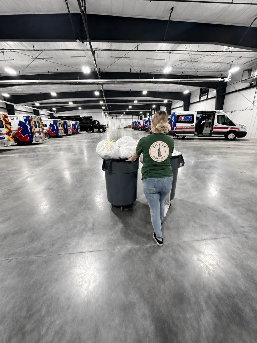 Tidy KC team member working in a large commercial cleaning space